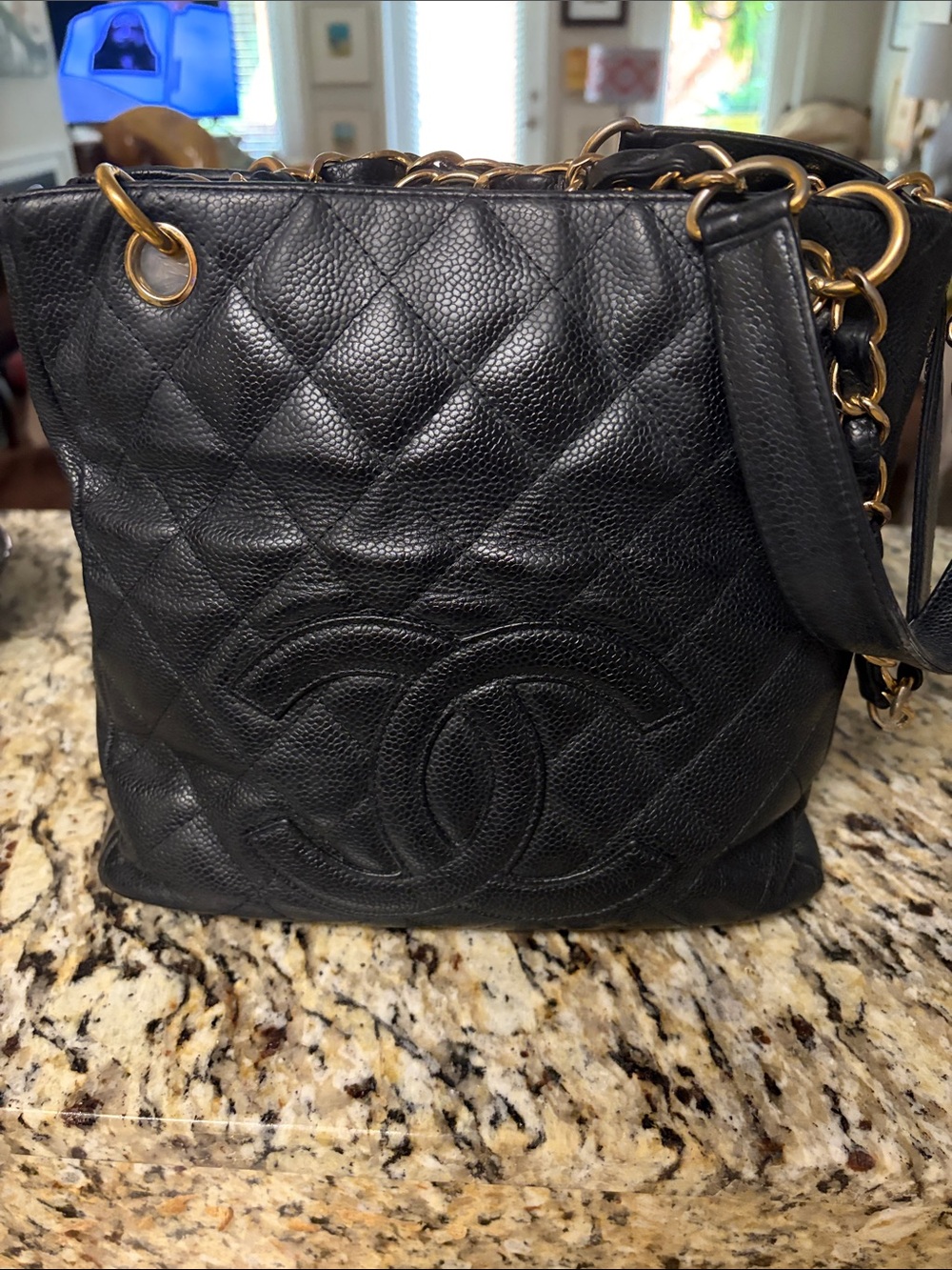 CHANEL Black Quilted Caviar Leather Drawstring Shoulder Bag with Gold Hardware